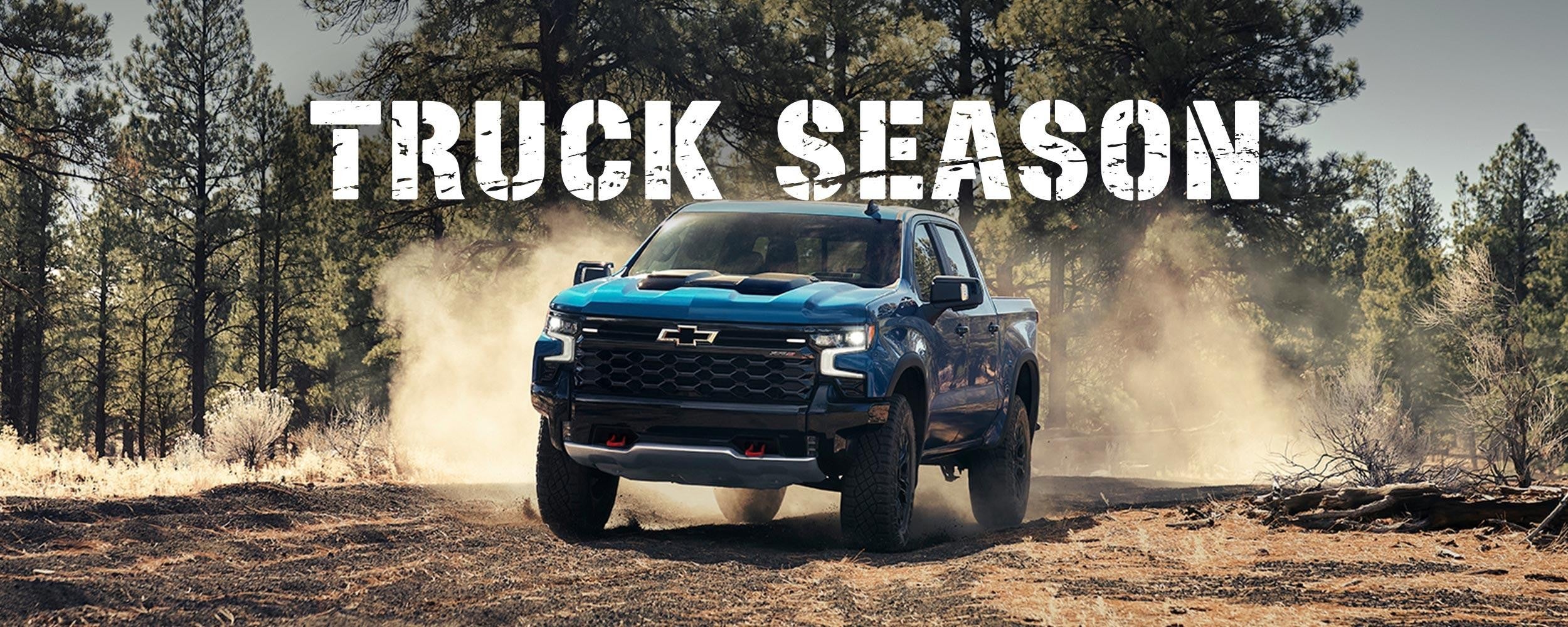 Truck session banner featuring a Chevrolet truck in a forest.